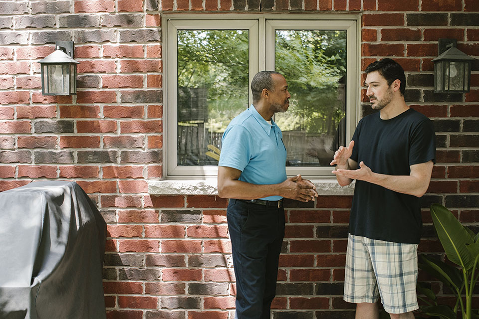 Homeowner receiving advice from energy auditor