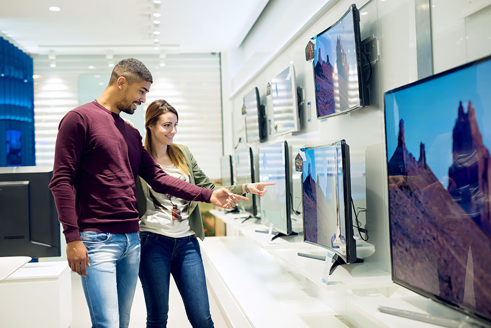 couple shopping for a television